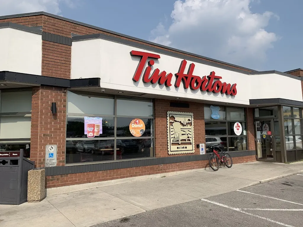 Tim Hortons storefront and interior at 390 Springbank Dr., London, ON