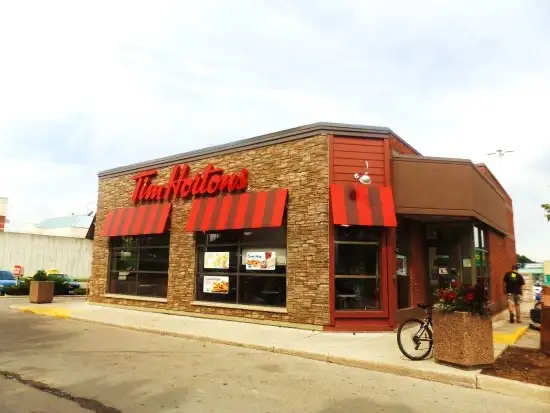 Tim Hortons storefront and interior at 670 Wonderland Rd N, London, ON