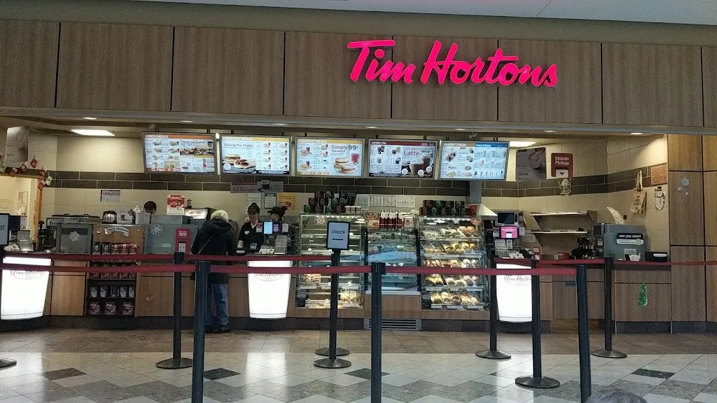 Tim Hortons storefront and interior at 785 Wonderland Rd South, London, ON