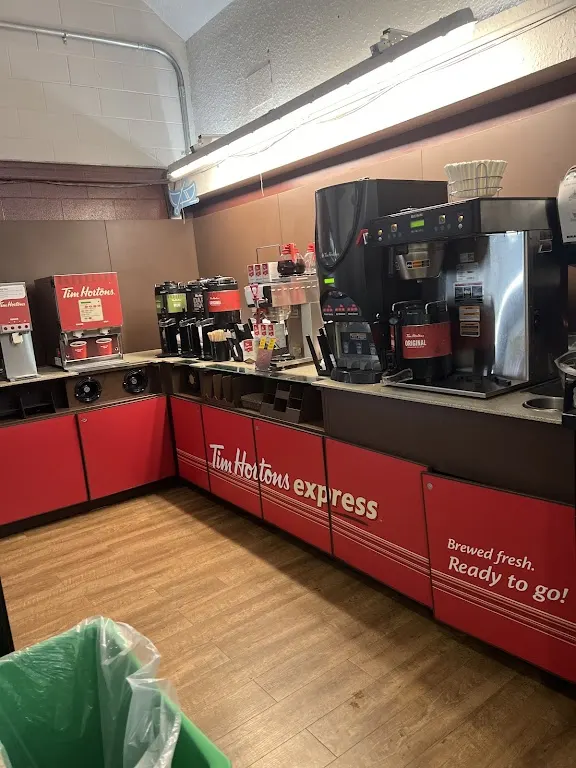 Tim Hortons storefront and interior at 1001 Fanshawe College Blvd, London, ON