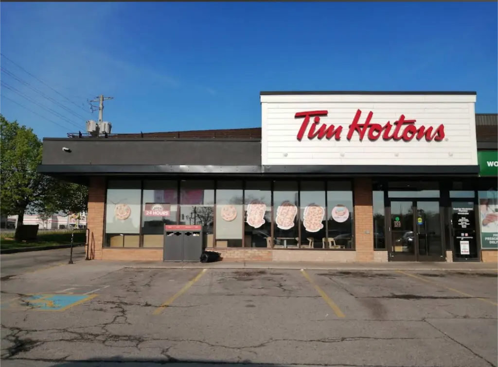 Tim Hortons storefront and interior at 1061 Wonderland Rd South, London, ON