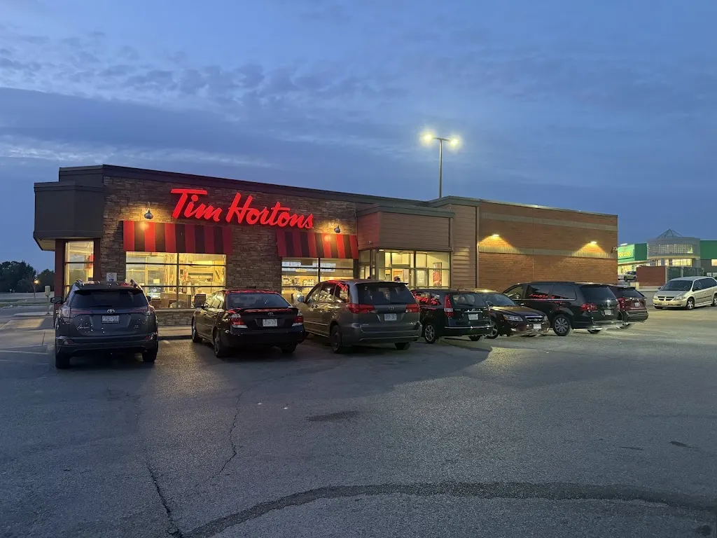 Tim Hortons storefront and interior at 1200 Commisioners Rd East, London, ON
