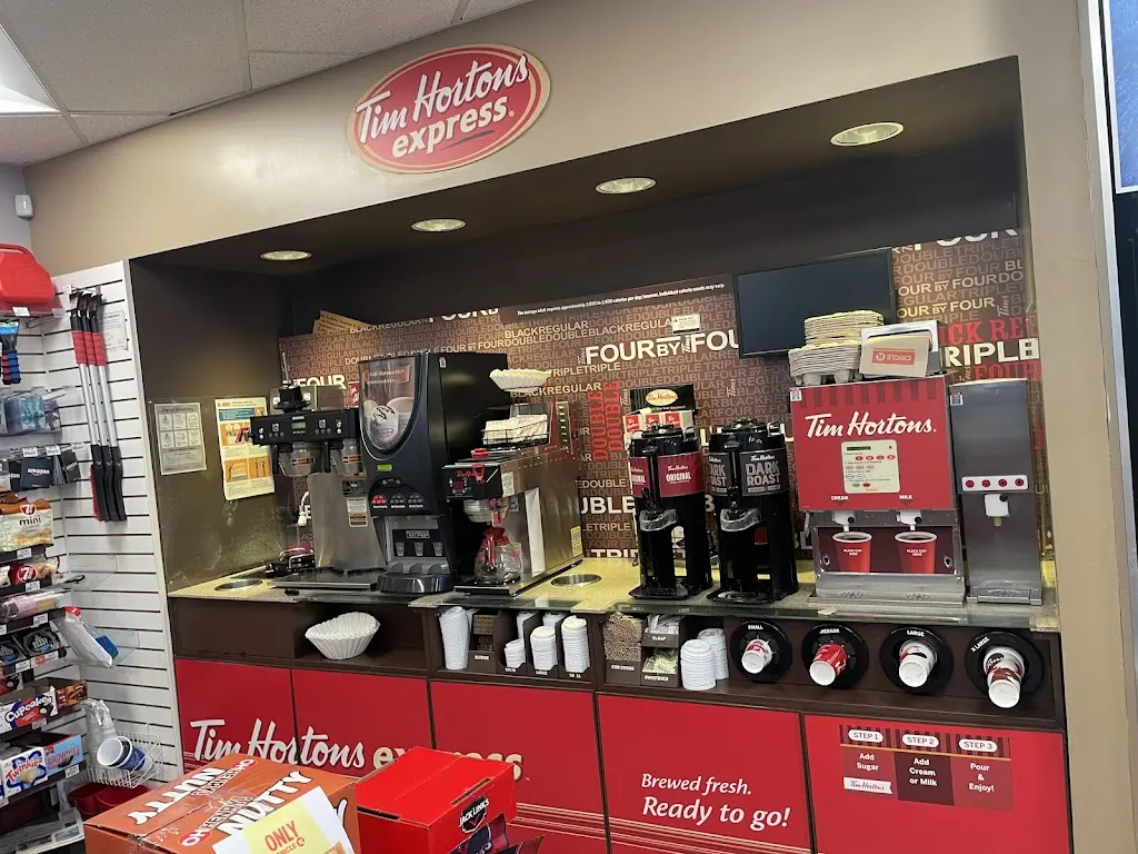 Tim Hortons storefront and interior at 1251 Wellington Rd S, London, ON