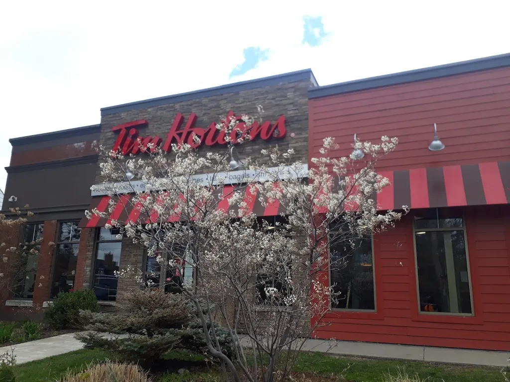 Tim Hortons storefront and interior at 1322 Commissioners Rd West, London, ON