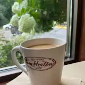Tim Hortons storefront and interior at 1322 Commissioners Rd West, London, ON
