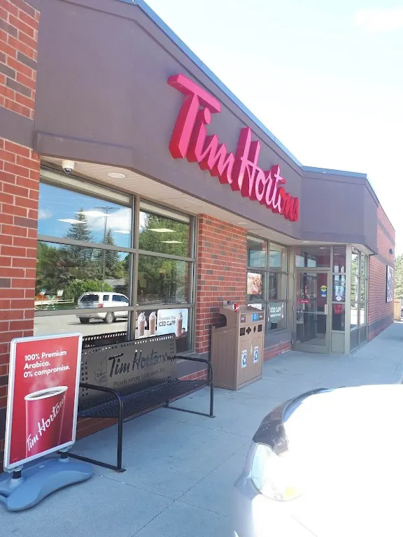 Tim Hortons storefront and interior at 33389 Richmond St, Lucan, ON