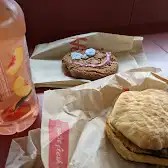 Tim Hortons storefront and interior at 2890 Steeles Avenue East, Markham, ON