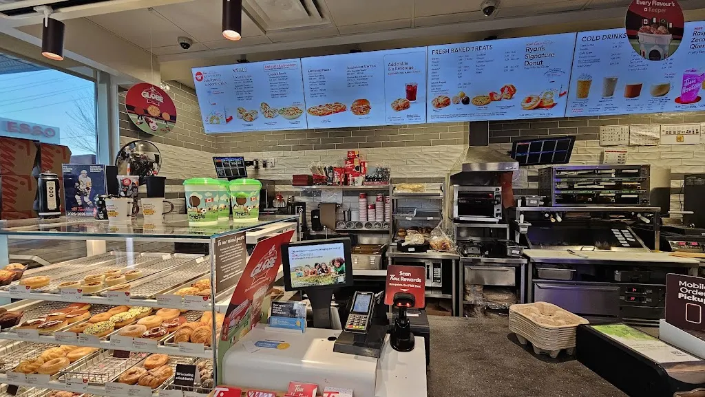 Tim Hortons storefront and interior at 8291 Woodbine Ave, Markham, ON