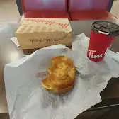 Tim Hortons storefront and interior at 8801 Woodbine Ave, Markham, ON