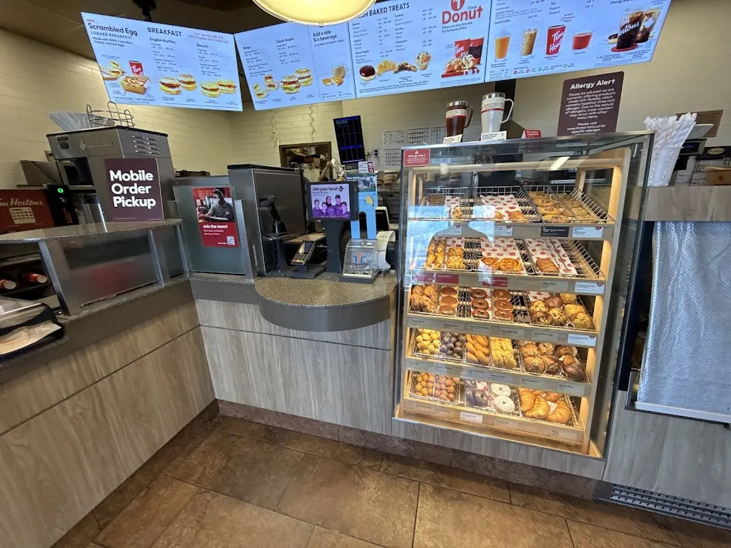 Tim Hortons storefront and interior at 3025 James Snow Parkway North, Milton, ON