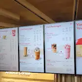 Tim Hortons storefront and interior at 30 Eglinton Ave W, Mississauga, ON