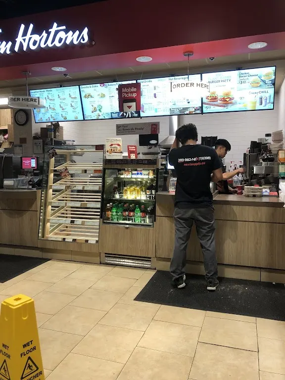 Tim Hortons storefront and interior at 450 Derry Rd West, Mississauga, ON