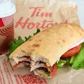 Tim Hortons storefront and interior at Pearson International Airport  - T3 Arrivals Pre Security, Mississauga, ON