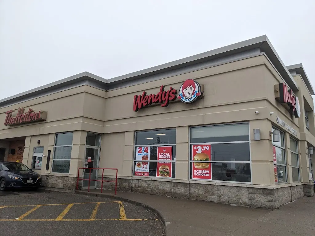 Tim Hortons storefront and interior at 6966 Financial Dr, Mississauga, ON
