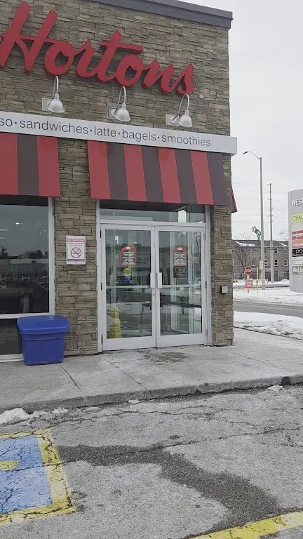 Tim Hortons storefront and interior at 7195 Goreway Dr, Mississauga, ON