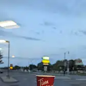 Tim Hortons storefront and interior at 12407 County Rd 2, Morrisburg, ON