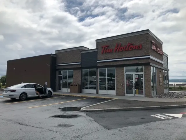 Tim Hortons storefront and interior at 54 May St, New Liskeard, ON
