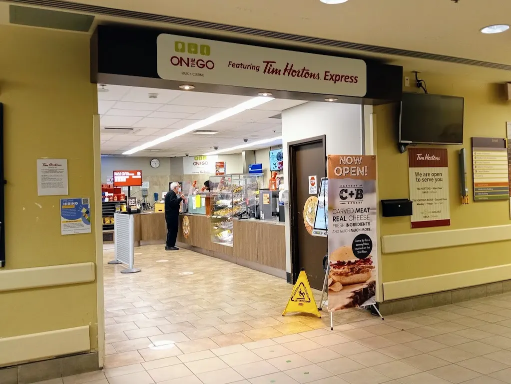 Tim Hortons storefront and interior at 596 Davis Dr, Newmarket, ON