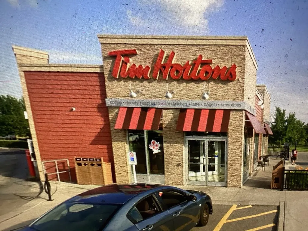 Tim Hortons storefront and interior at 685 Stonehaven Ave, Newmarket, ON