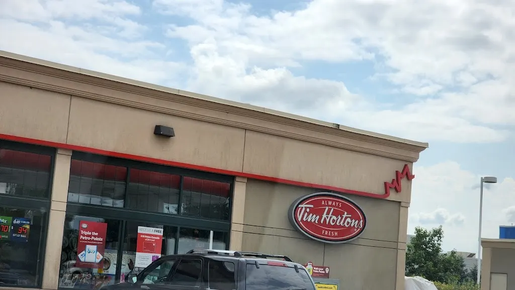 Tim Hortons storefront and interior at 7307 Oakwood Dr, Niagara Falls, ON