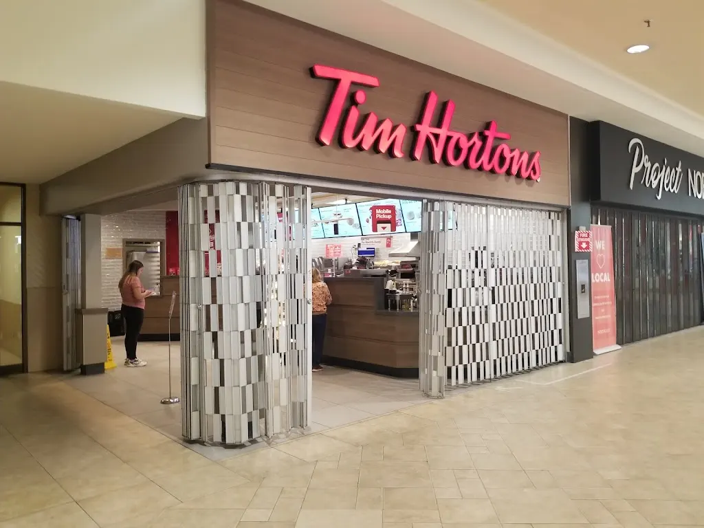 Tim Hortons storefront and interior at 1500 Fisher Ave, North Bay, ON