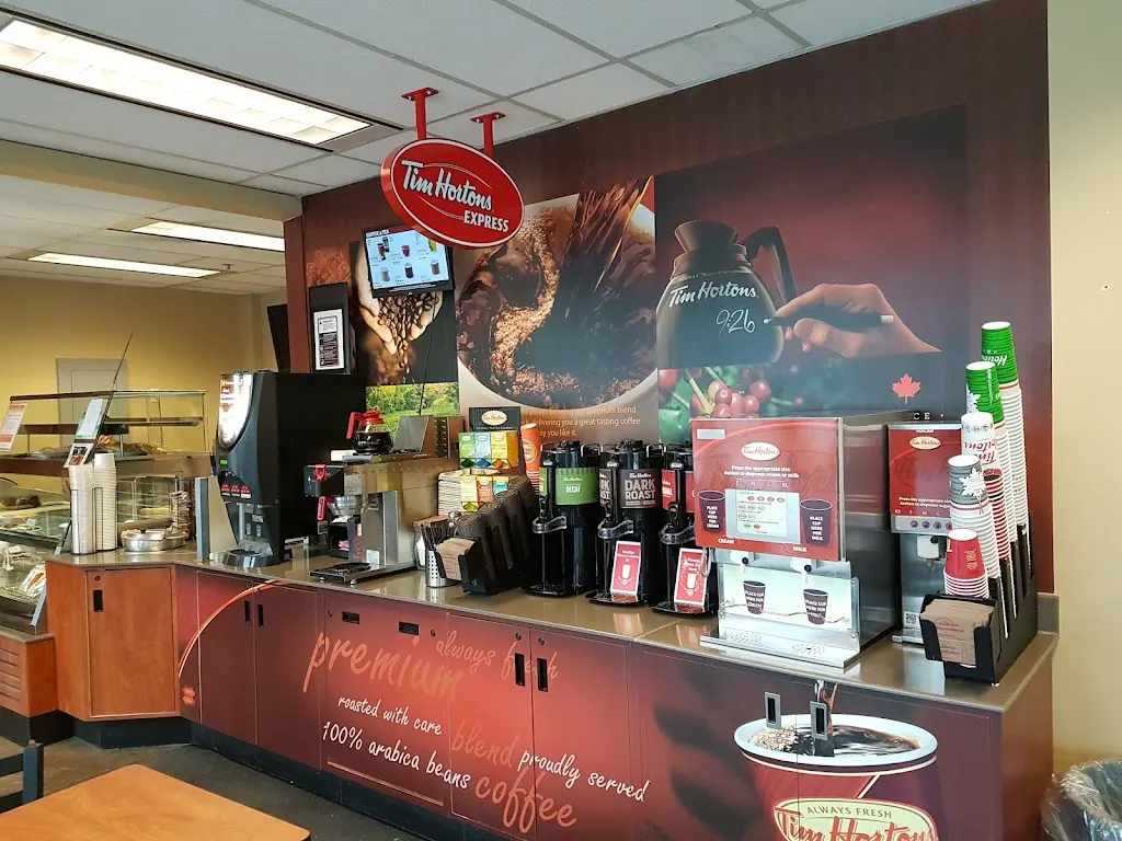 Tim Hortons storefront and interior at 105 Moatfield Dr, North York, ON