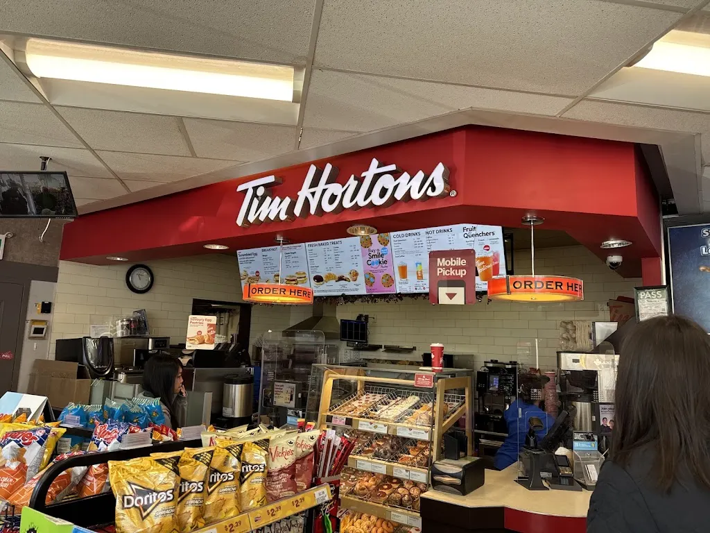 Tim Hortons storefront and interior at 461 Sheppard Ave East, North York, ON