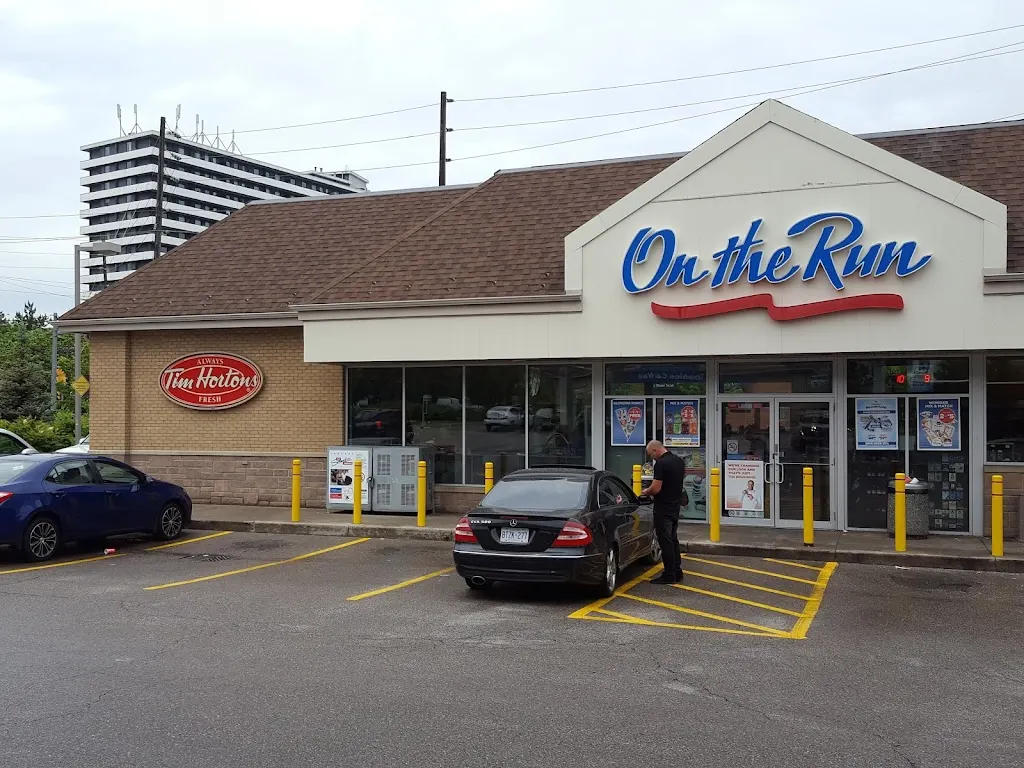 Tim Hortons storefront and interior at 515 Drewry Ave, North York, ON