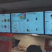 Tim Hortons storefront and interior at 1060 Finch Ave West, North York, ON