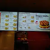 Tim Hortons storefront and interior at 1533 Jane St, North York, ON