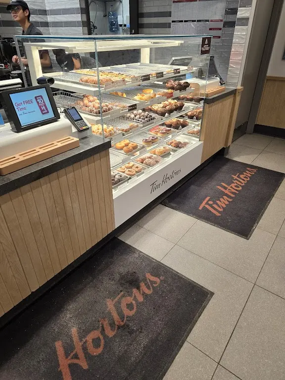 Tim Hortons storefront and interior at 1725 Eglinton Ave East, North York, ON