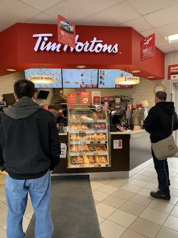 Tim Hortons storefront and interior at 3514 Weston Rd, North York, ON