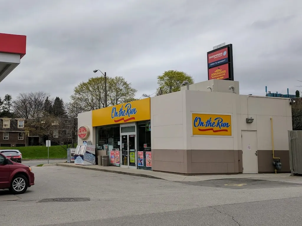 Tim Hortons storefront and interior at 4751 Leslie St, North York, ON