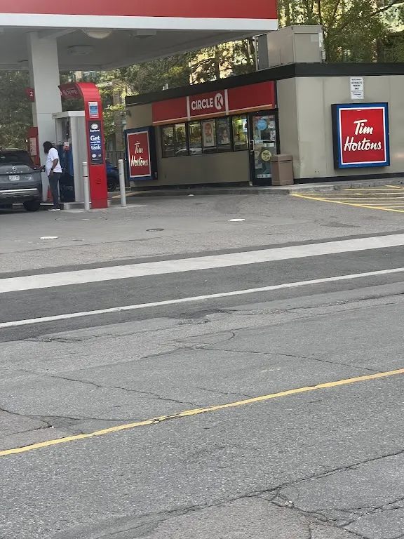 Tim Hortons storefront and interior at 5571 Yonge St, North York, ON
