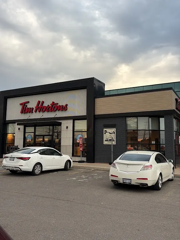 Tim Hortons storefront and interior at 228 Wyecroft Rd, Oakville, ON