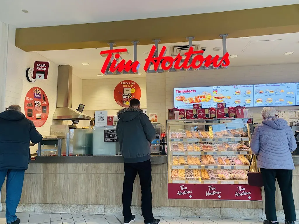 Tim Hortons storefront and interior at 240 Leighland Ave, Oakville, ON