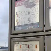 Tim Hortons storefront and interior at 494 Dundas St W, Oakville, ON