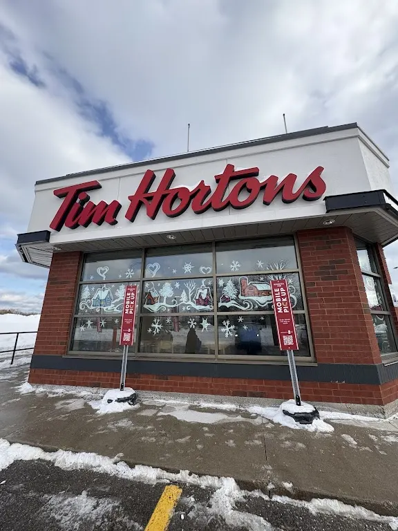 Tim Hortons storefront and interior at 515 Maplegrove Dr, Oakville, ON