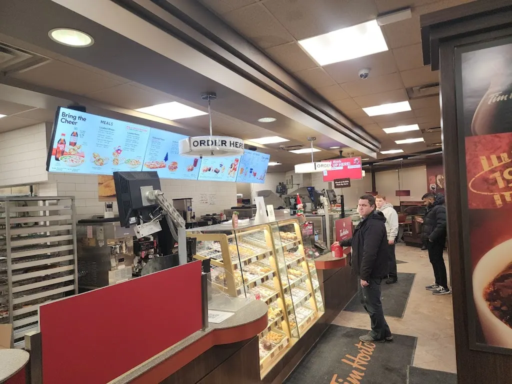 Tim Hortons storefront and interior at 520 Dundas St West, Oakville, ON