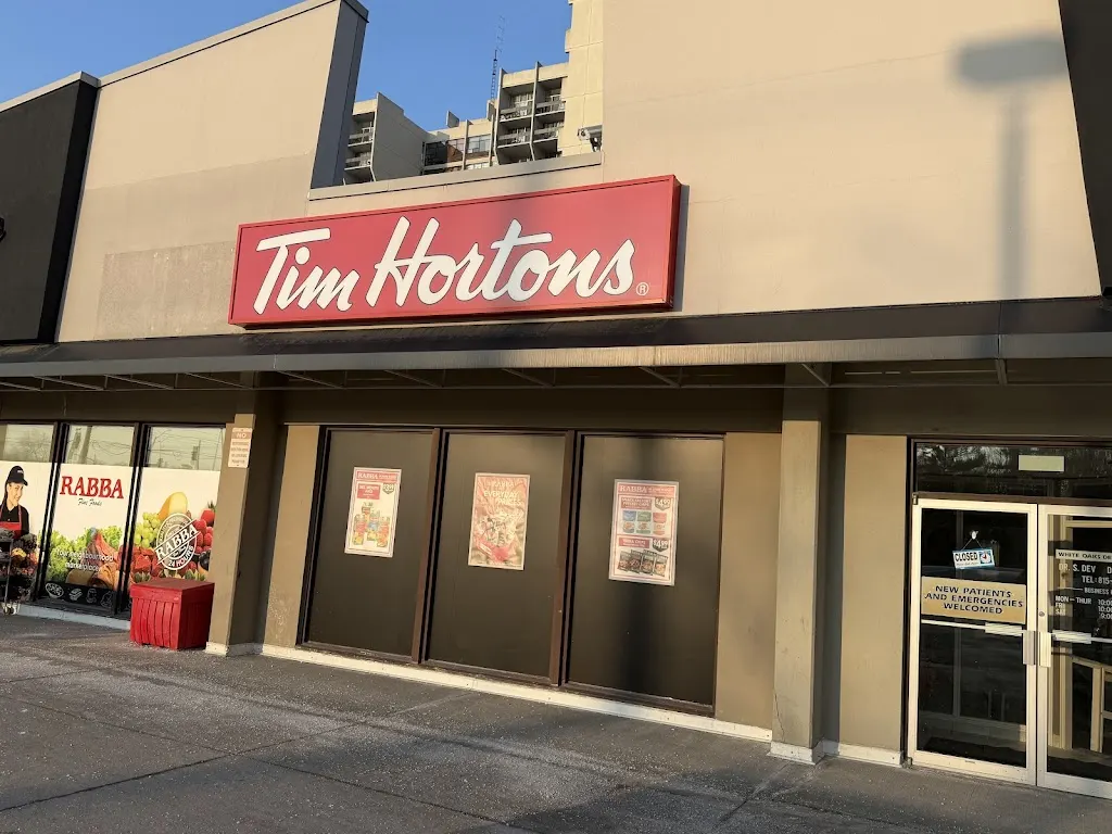 Tim Hortons storefront and interior at 1289 Marlborough Court, Oakville, ON