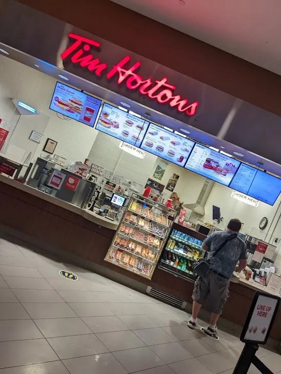 Tim Hortons storefront and interior at Oakville Hospital Self Serve, Oakville, ON