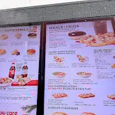 Tim Hortons storefront and interior at 3869 Innes Rd, Orleans, ON