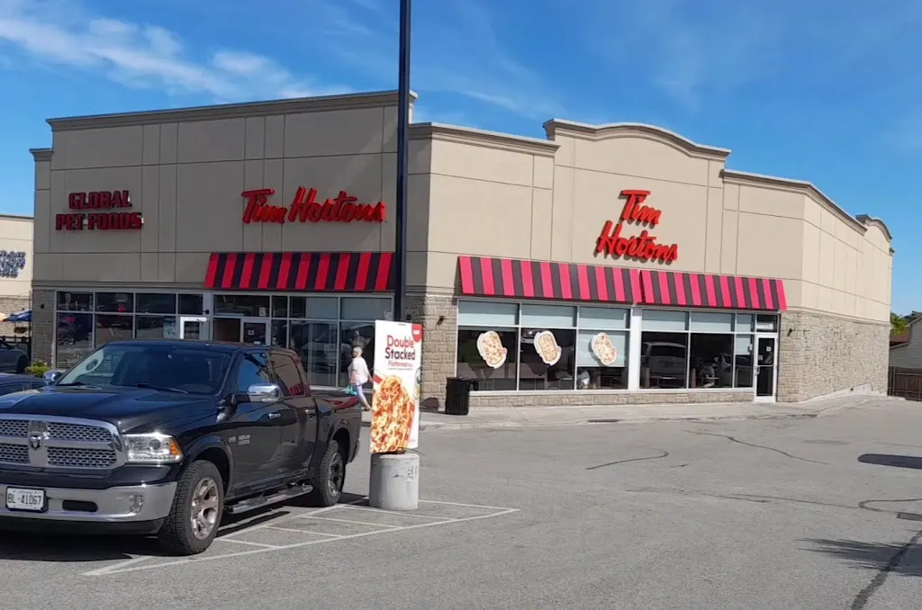 Tim Hortons storefront and interior at 575 Thornton Road North, Oshawa, ON