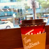 Tim Hortons storefront and interior at 3309 Simcoe St, Oshawa, ON