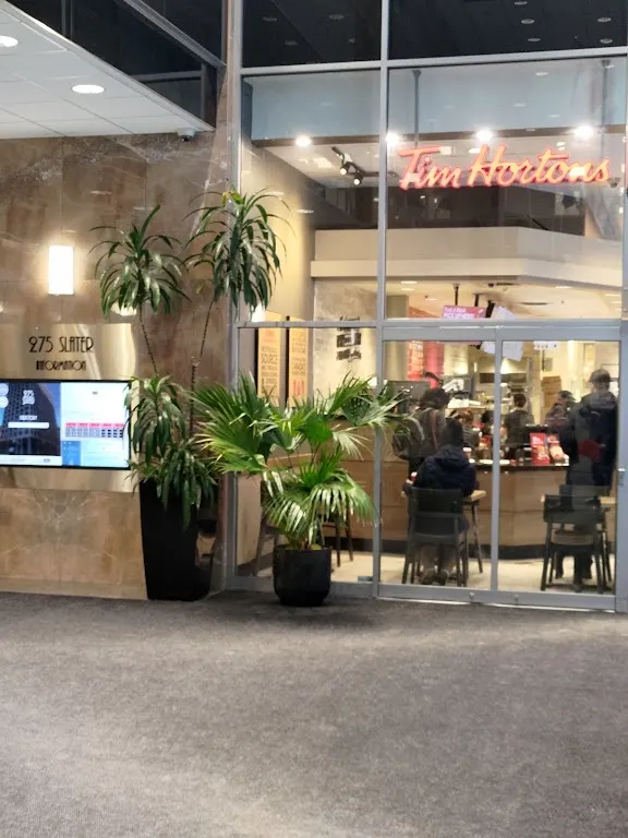 Tim Hortons storefront and interior at 275 Slater St, Ottawa, ON