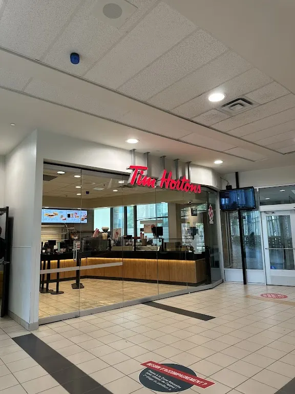 Tim Hortons storefront and interior at 801 Aviation Parkway, Ottawa, ON