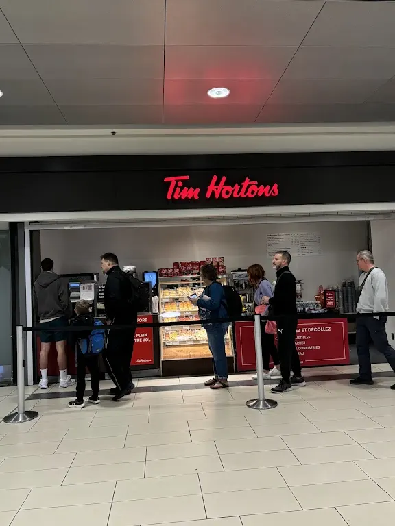 Tim Hortons storefront and interior at 1000 Airport Parkway Private, Ottawa, ON
