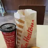 Tim Hortons storefront and interior at 1665 Hunt Club Rd, Ottawa, ON