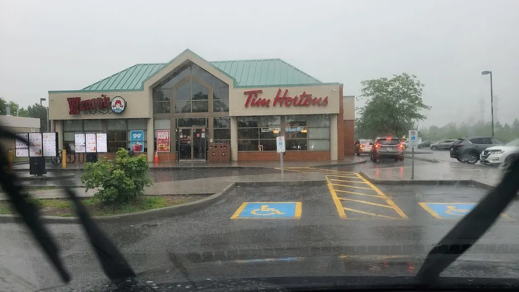 Tim Hortons storefront and interior at 1950 Walkley Rd, Ottawa, ON