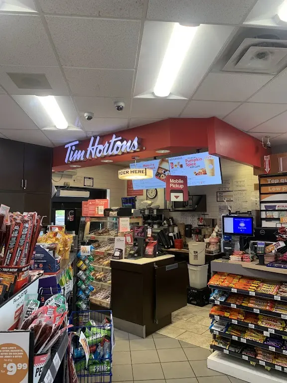 Tim Hortons storefront and interior at 2100 Hunt Club Rd, Ottawa, ON